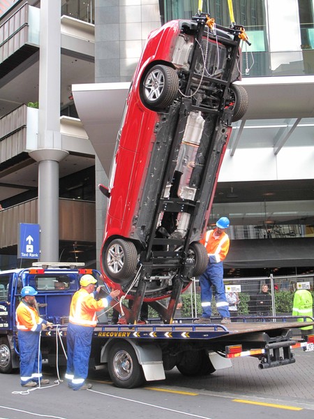 The Mercedes-Benz is securely fastened to the cradle.